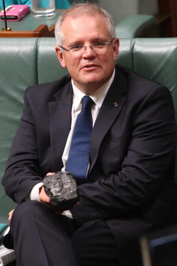 Scott Morrison with a lump of coal in parliament
