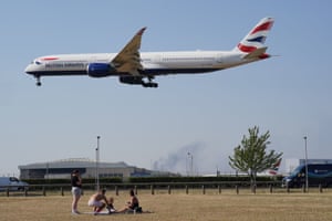 A British Airways flight coming into land above a dry Heathrow airport