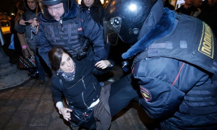 Pussy Riot member Nadezhda Tolokonnikova being detained by police at a protest in central Moscow in February 2014.