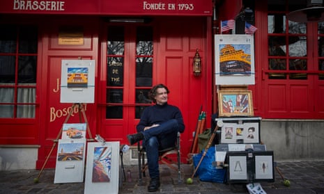 Artist Jerome Feugueur waiting for customers at Place du Tertre in Montmartre.