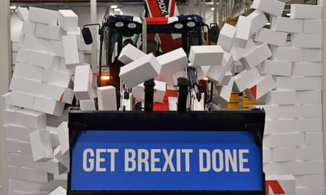 ‘ The election campaign had just hit a new low.’ Johnson drives a JCB through a wall with the Conservative Party slogan ‘Get Brexit Done’ in the digger bucket.