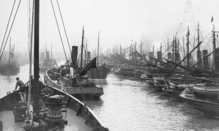 The masts of many steam-powered fishing trawlers in a crowded Yarmouth harbour in 1933
