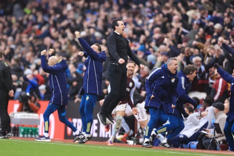 Unai Emery and the Aston Villa coaching staff celebrate their side's late winner against Arsenal