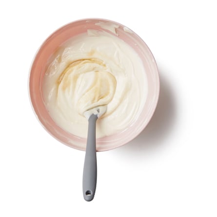 Felicity Cloake’s frozen yoghurt: whisking in the brownish sugar.