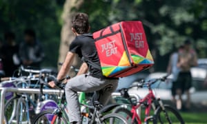 A Just Eat hot food delivery cyclist in the UK.