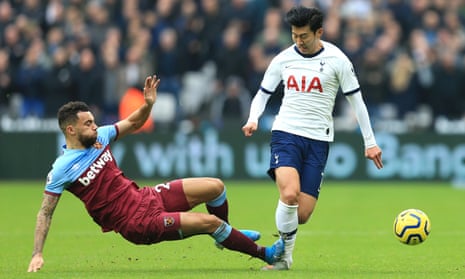 Ryan Fredericks of West Ham United fouls Heung-Min Son of Tottenham Hotspur and receives a yellow card.