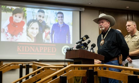 Merced County Sheriff Vern Warnke speaks at a news conference about the kidnapping of 8-month-old Aroohi Dheri, her mother Jasleen Kaur, her father Jasdeep Singh, and her uncle Amandeep Singh, in Merced, Calif., on Wednesday, Oct. 5, 2022. Relatives of the family kidnapped at gunpoint from their trucking business in central California pleaded for help Wednesday in the search for an 8-month-old girl, her mother, father and uncle, who authorities say were taken by a convicted robber who tried to kill himself a day after the kidnappings. (Andrew Kuhn/The Merced Sun-Star via AP)