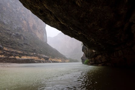 a river flows in a canyon