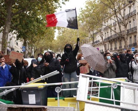 Students block the road outside Sciences Po during a protest in Paris, France.