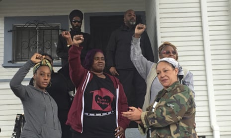 Moms 4 Housing members, including Dominique Walker, left, outside the house in Magnolia Street in Okland which they will now able to buy.
