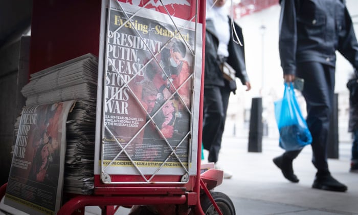 Copies of the Evening Standard newspaper being handed out outside Wesminster Underground station, London, in February.