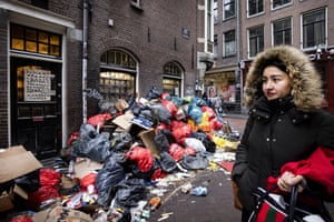 Amsterdam, Netherlands. Bin bags pile up during a strike by rubbish collectors who are demanding better pay