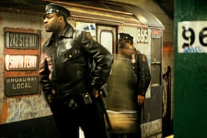 a Willy Spiller photo titled "On the Beat, Police Control, 72nd St. Station West Side IRT Line, 1977-1985" - two policemen stand on a subway platform observing their surroundings