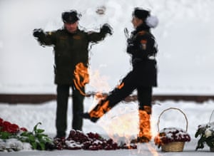 Moscow, Russia. A female military cadet marches in front of the Eternal Flame at the WWII memorial complex at Poklonnaya Hill during a rehearsal for the upcoming Defender of the Fatherland Day