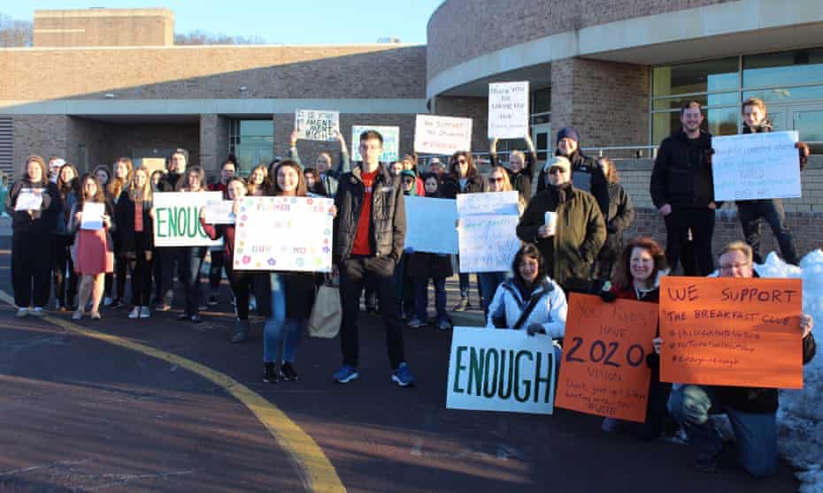 Supporters greet pupils on their way to Saturday morning detention at Pennridge High School