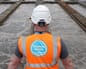 Thames Water’s Mogden sewage treatment works in west London with TW worker in foreground, back to camera
