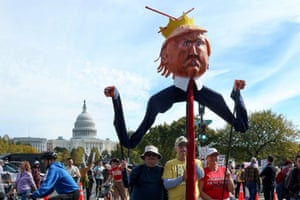 Demonstrators hold an effigy depicting Donald Trump in Washington DC.