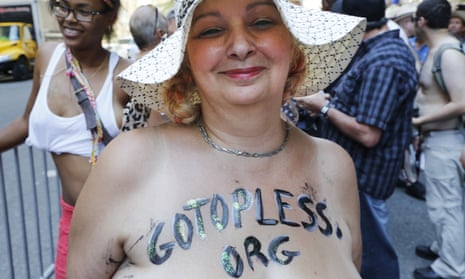 Topless protesters bare breasts in push for women's rights | Protest | The  Guardian