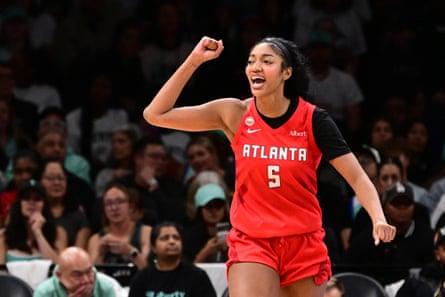 Angel Reese celebrates during Atlanta’s Game 3 victory over New York on Friday night, which sent the Dream into the WNBA finals.
