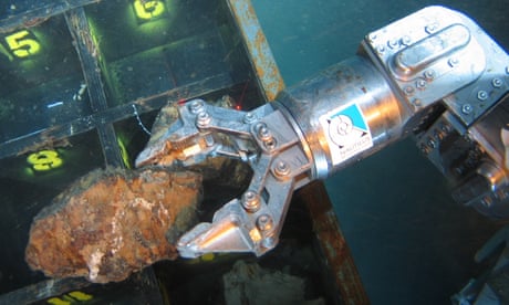 Rock sampling taking place off the coast of Papua New Guinea.