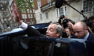 Nigel Farage waves to supporters.