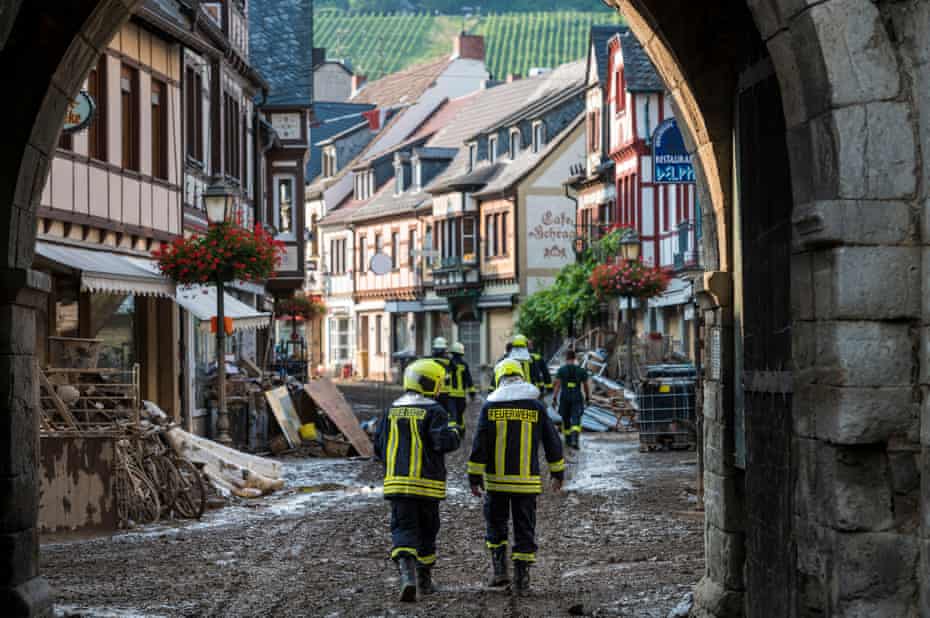A muddy city center thoroughfare
