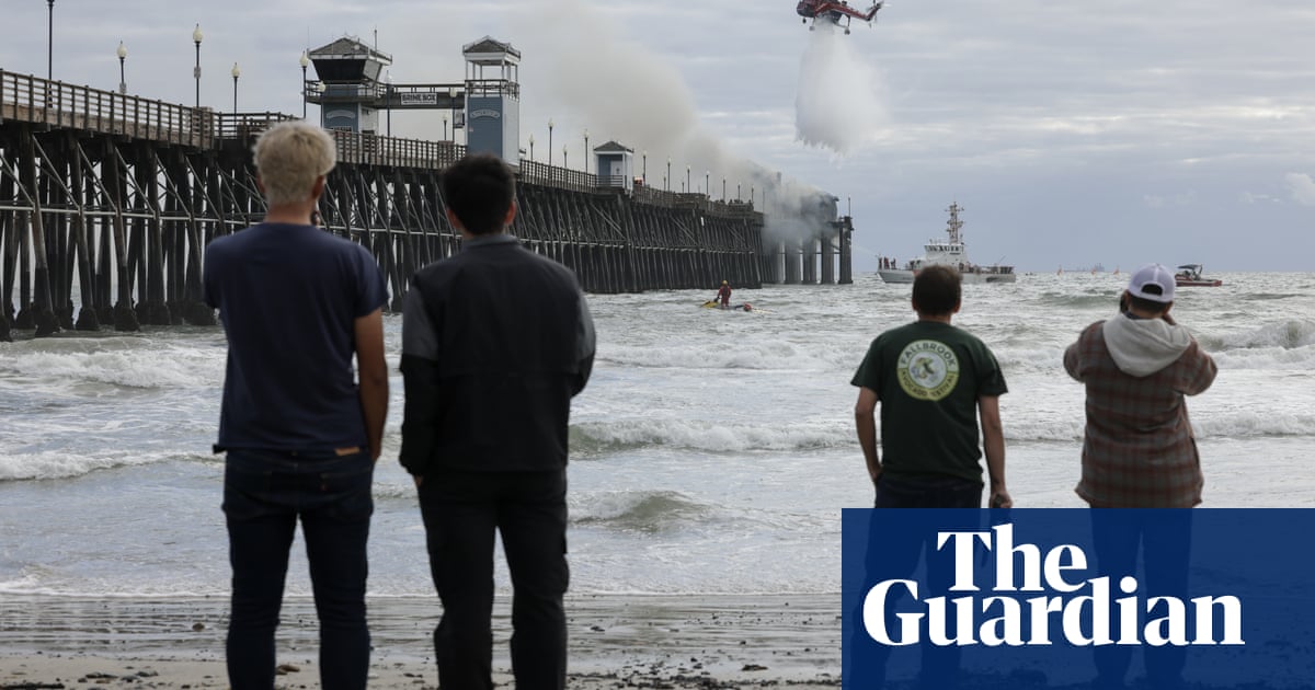 Crews battle fire threatening longest wooden pier on US west coast