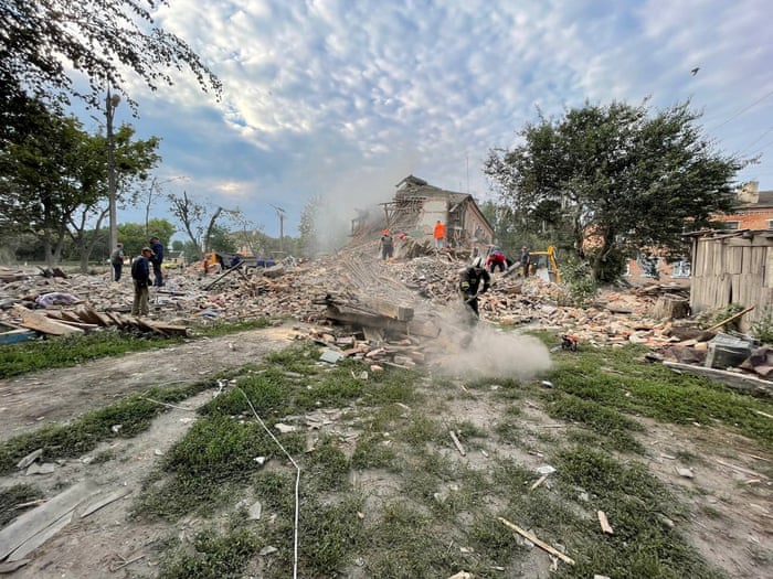 Emergency crew work amidst collapsed building site in Chuhuiv Town, Kharkiv, Ukraine, in this handout image obtained by REUTERS on 16 July, 2022.