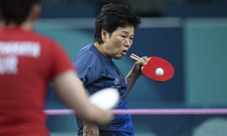 Xia Lian Ni plays a shot against Sibel Altinkaya