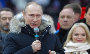 Vladimir Putin addresses a rally in his support at the Luzhniki Stadium ahead of the 2018 Russian presidential election scheduled for March 18.