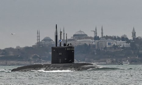 The Russian navy's Kilo class submarine Rostov-on-Don sails through the Bosphorus Strait, Turkey, on the way to the Black Sea on 13 February.