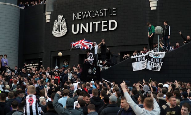 Newcastle United supporters celebrate outside St James' Park. uk,Premier League clubs,Newcastle,Newcastle deal,Saudi-led consortium,Crown Prince Mohammed bin Salman,harbouchanews