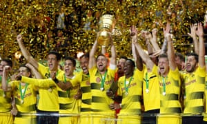 Borussia Dortmund players, including Ousmane Dembélé (right of centre) celebrate their win over Eintracht Frankfurt in the 2016-17 DFB-Pokal final.