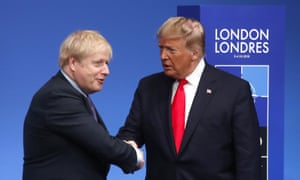 Boris Johnson shakes hands with Donald Trump