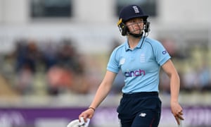 Charlotte Dean of England reacts as she leaves the field after being caught by Katey Martin