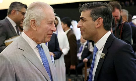 King Charles (left) speaks with the UK prime minister, Rishi Sunak, as they attend the opening ceremony of the world climate action summit at Cop28 in Dubai.