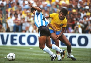 Diego Maradona battles with Brazil’s Toninho Cerezo during a 1982 World Cup tie in which he was sent off.