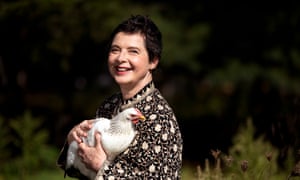 Actress, model and filmmaker Isabella Rossellini holds one of her heritage chickens on her Mama Farm in Brookhaven, New York.
