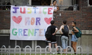 Justice for Grenfell banner in area near the Tower