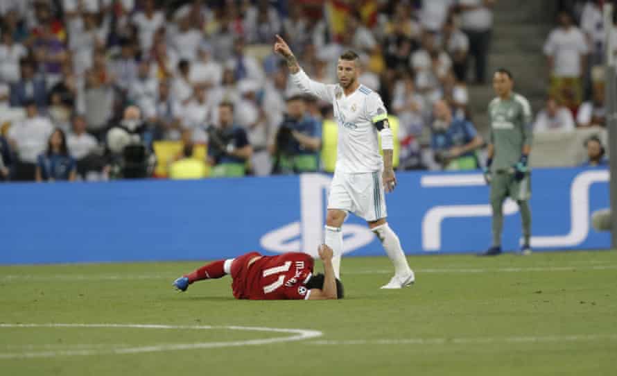 Salah lies injured after tussling with Sergio Ramos during the 2018 Champions League final.
