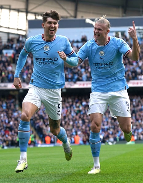 John Stones and Erling Haaland.
