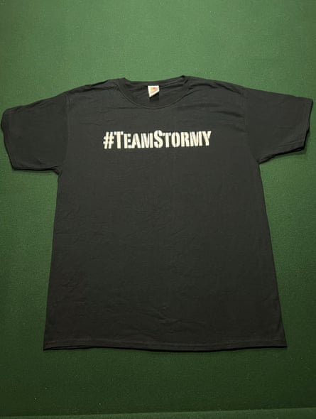 black t shirt says ‘#teamstormy’