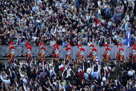 Swiss guards march at the St. Peter's Square after white smoke rose from the chimney on the Sistine Chapel.