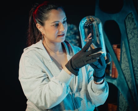 Metaphor … Carla (Serin Ibrahim) examines a wasp specimen a bell jar.