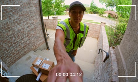Packages being delivered to a home, as seen from a security camera.