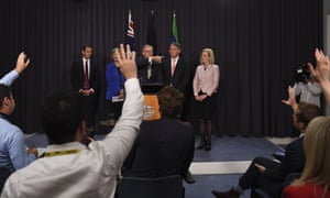 Australian prime minister Anthony Albanese and his interim ministers, Penny Wong, Jim Chalmers, Richard Marles and Katy Gallagher, speak to the media during a press conference, journalists have their hands raised to ask questions