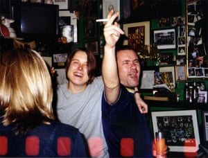 In the 1990s the club attracted a new coterie of artists who became known as the YBAs (Young British Artists). Sarah Lucas, left, and Damien Hirst were invited to serve as bar staff for one night. Hirst gave the club a spot painting, which for years hung above the bar wrapped in clingfilm to protect it from cigarette smoke and other substances. Lucas also contributed a work to the club’s walls, a self portrait composed of twisted cigarettes.