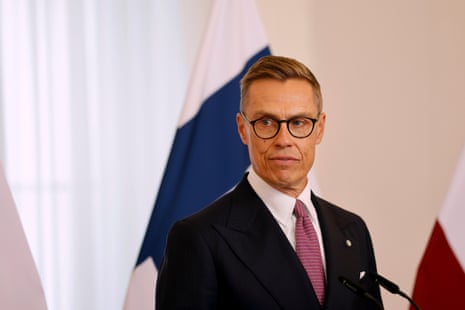 Alexander Stubb attends a press conference during a visit to Latvia.