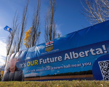 A banner reading “It’s OUR Future Alberta!” stands among bare trees in rural Alberta, promoting separation