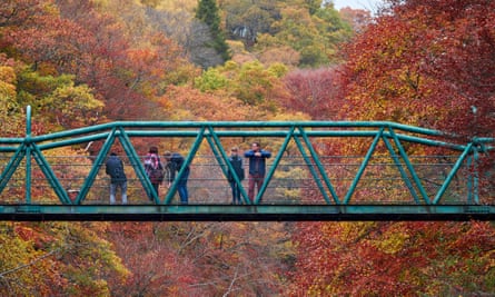 The Green Footbridge over the River Garry at the Pass of Killiecrankie in autumn.